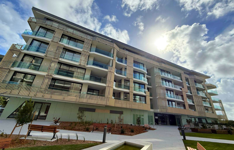 Exterior building washing at Woolooware Shores retirement village by ISO-certified technicians