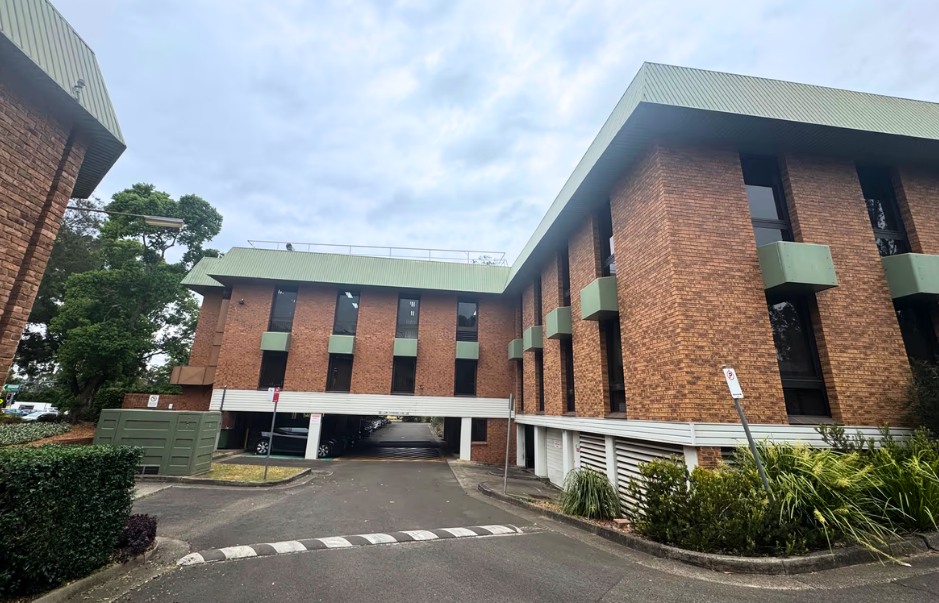 Hawkesbury Council window cleaning — Shimmer technicians cleaning glazed facade at Windsor council building