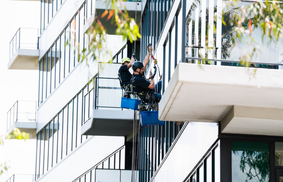high rise window cleaning cost sydney - property manager reviewing a facade cleaning quote